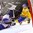 HELSINKI, FINLAND - JANUARY 2: Slovakia's Christian Jaros #26, Juraj Mily #12, Adam Huska #30 and Sweden's Oskar Lindblom #23 watch the puck cross the line for Team Sweden's second goal of the game during quarterfinal round action at the 2016 IIHF World Junior Championship. (Photo by Matt Zambonin/HHOF-IIHF Images)

